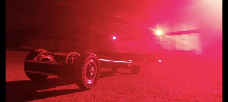 The assembled electric mountain board, illuminated.
