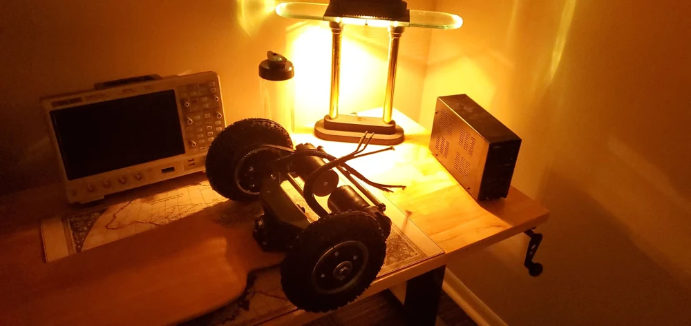 The two-wheel drivetrain on the electronics bench.