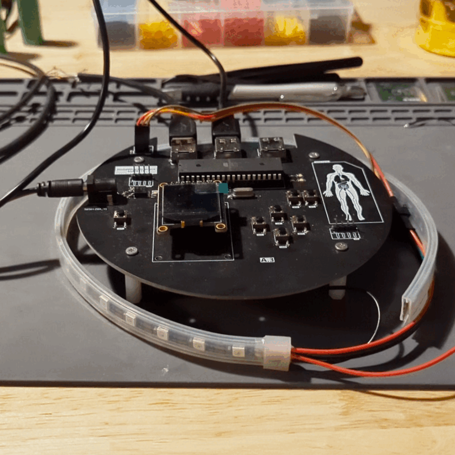 The populated circuit board above the perimeter light strip.