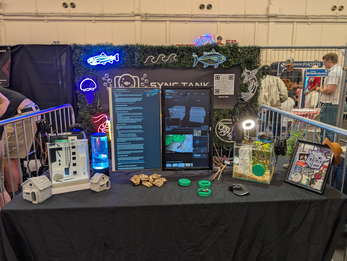 Open Sauce 2026: two aquariums, camera hardware, and the observation interface.