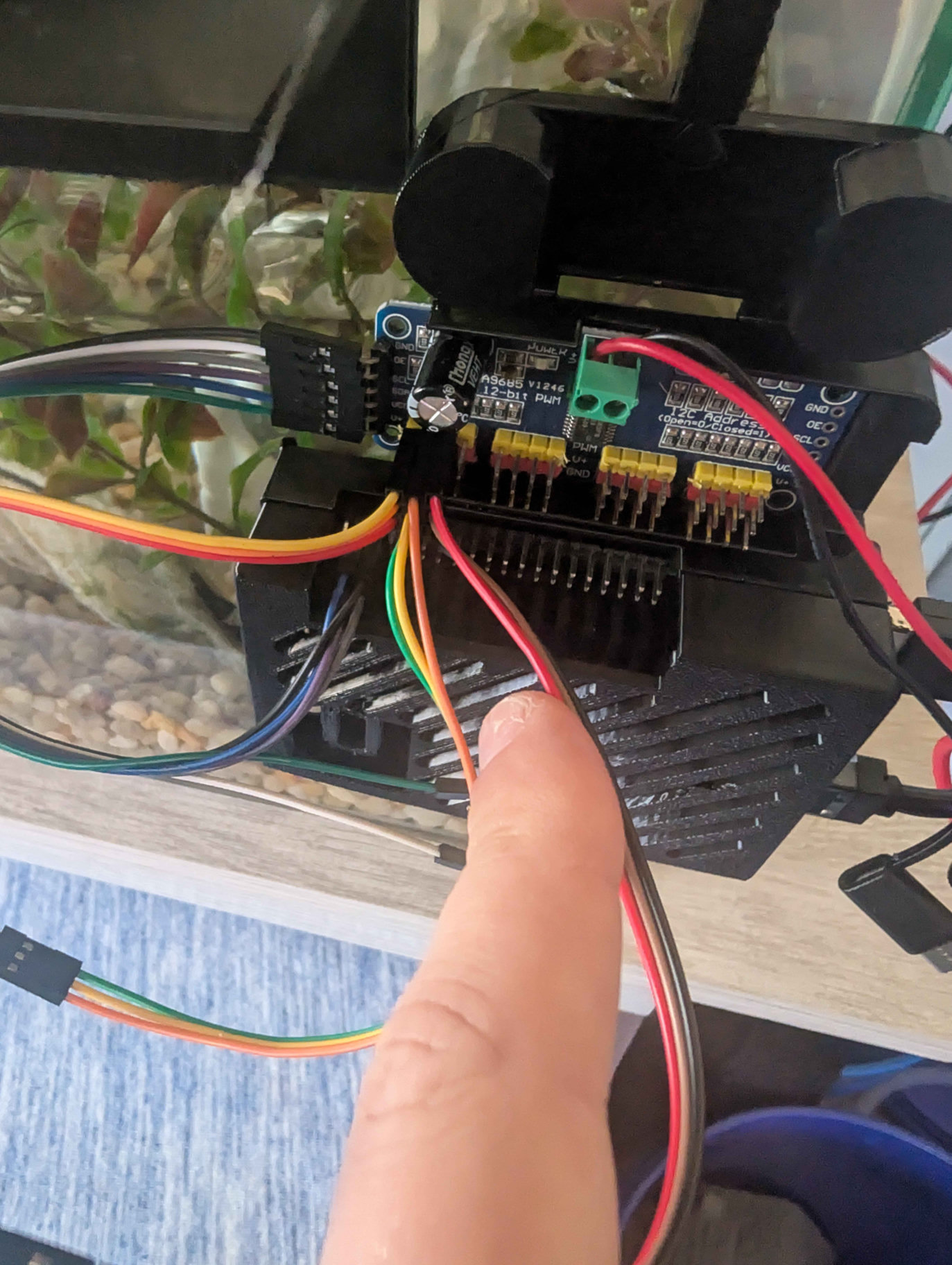 The project's PCA9685 servo controller and field wiring on the Reeflex assembly